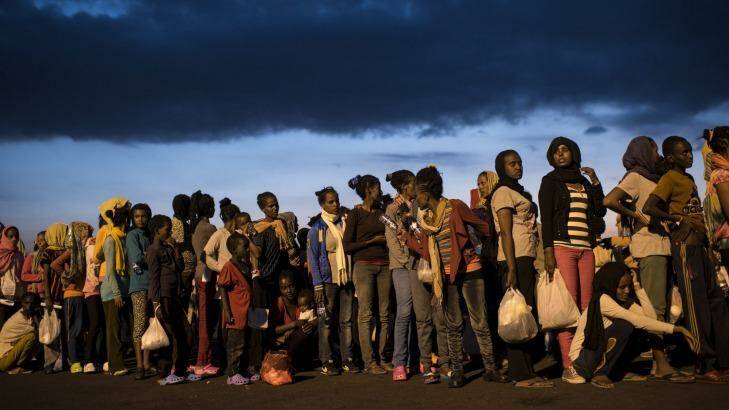 Human cargo: Hundreds of migrants from sub-Saharan Africa arrive in Sicily in September. Photo: New York Times