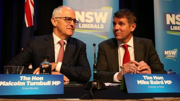 United front: Mr Turnbull and Mr Baird speak at Saturday's NSW Liberal Party state conference. Photo: Louise Kennerley