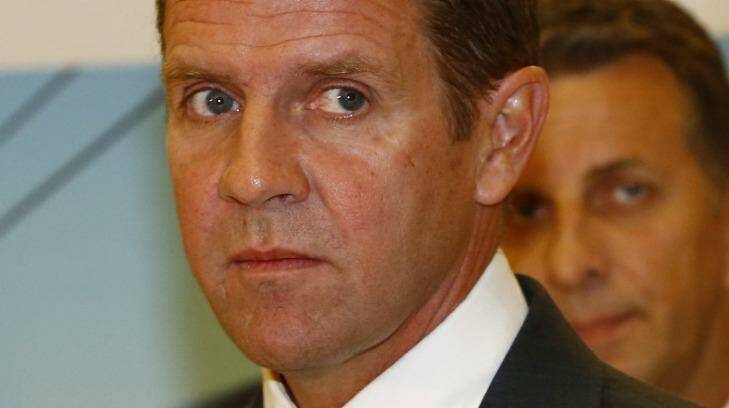 Mike Baird is under huge pressure over his decision to ban greyhound racing. Photo: Daniel Munoz