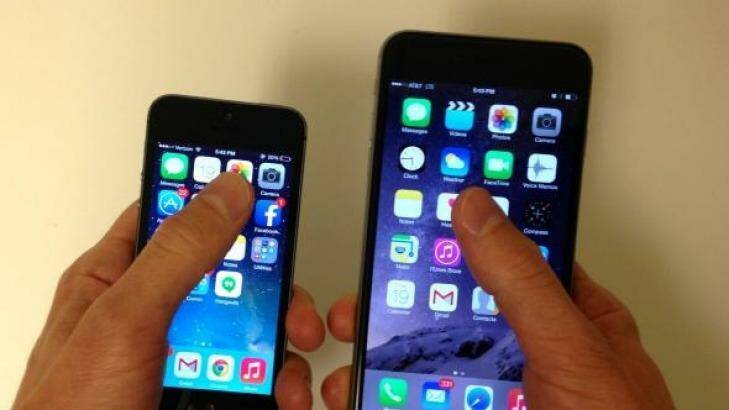 This is how far my thumb can reach on the iPhone 5 (left) and on the iPhone 6 Plus (right). Photo: Lily Newman / Slate