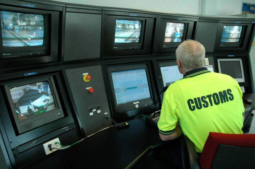 Thinning the ranks: Senior management jobs in the Customs Service and the Immigration Department are are to be cut. Photo: Australian Customs Service