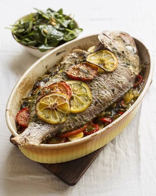 Frank Camorra's whole snapper baked on potatoes and capsicum, with wilted spinach <a href="http://www.goodfood.com.au/good-food/cook/recipe/whole-snapper-baked-on-potatoes-with-wilted-spinach-20140203-31vr9.html?aggregate=513278"><b>(recipe here).</b></a> Photo: Marina Oliphant