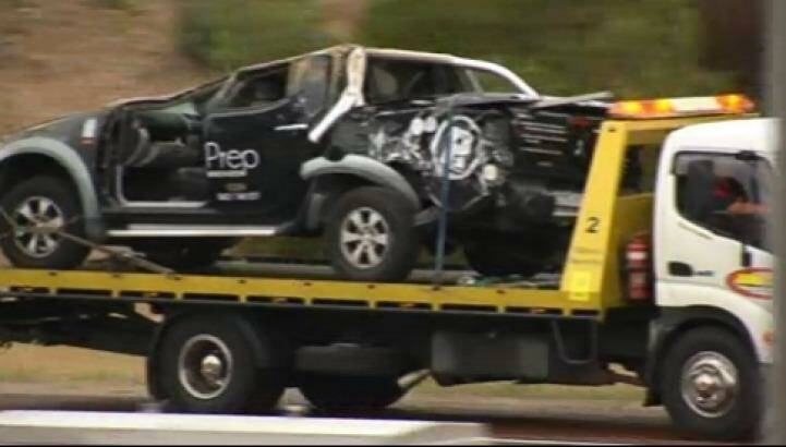 Mitchell Freeway crash: a  door had to be removed from this vehicle to allow the driver to get out. Photo: Michael Genovese, Nine News