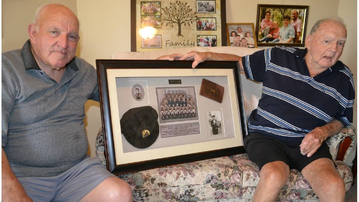 Collie pair: Pedro Wallis and Ernie Swallow display some well-earned West Australian State Schoolboys memorabilia. Photo: Collie Mail.