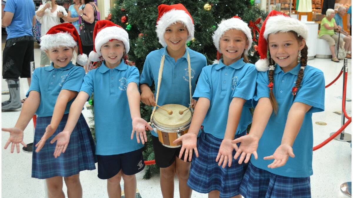 The sound of many tiny voices filled Halls Head Central last week as Riverside Primary School students sang Christmas carols for shoppers. Photo: Brianna Johnson/Mandurah Mail.