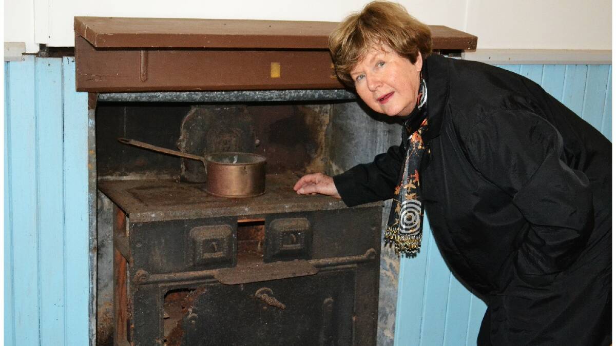 Jan Matthews checks out the crumbling Metters No 2 stove she wants to replace.