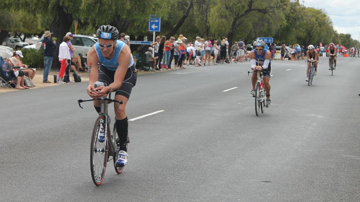 Almost 2,000 competitors participated in the ten year anniversary of the SunSmart Ironman WA. Pictured are competitors on the bike leg. Photo: Busselton-Dunsborough Mail.