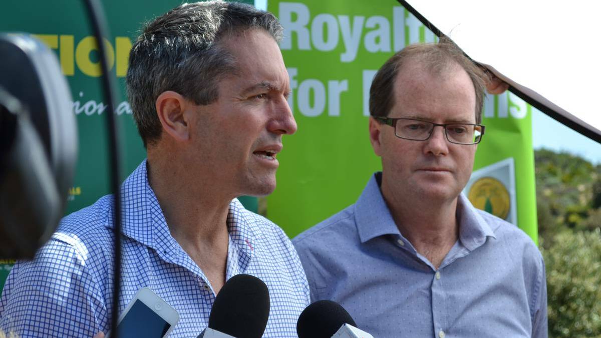 Nationals WA president Terry Redman and Vasse by-election candidate Peter Gordon campaign on the mobile communications issue in Gracetown.