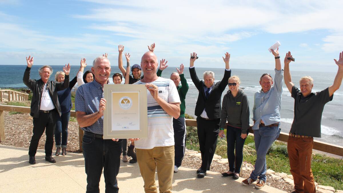 Gnarly achievement: Augusta-Margaret River Shire president Mike Smart and Surfing WA’s Mark Lane celebrate the Margaret River Pro’s gold award with the event’s supporters, including Greg and Terry Bettenay of Margaret River Nougat, Jayme Hatcher of the AMR Tourism Association, Chloe Robinson and Alex Scott of Margaret River Burger Company, Nelson Rodgers of the AMR Football Club, AMR Shire chief executive Gary Evershed, Rebecca Cameron of Settlers Tavern, Barry Tate of the AMR Football Club and Gary Bennett of Jahroc Galleries.