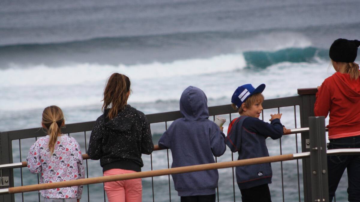 Young spectators enjoy a great view.
