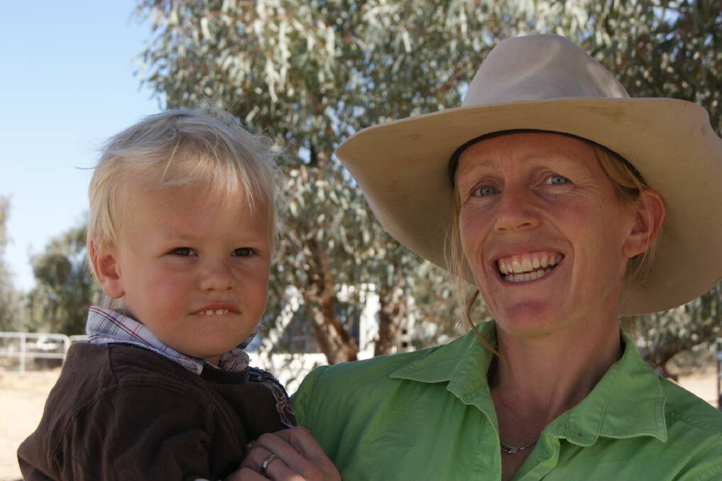 English backpacker turned Australian farmer, Michelle  Reay and one of her four children. Pic supplied