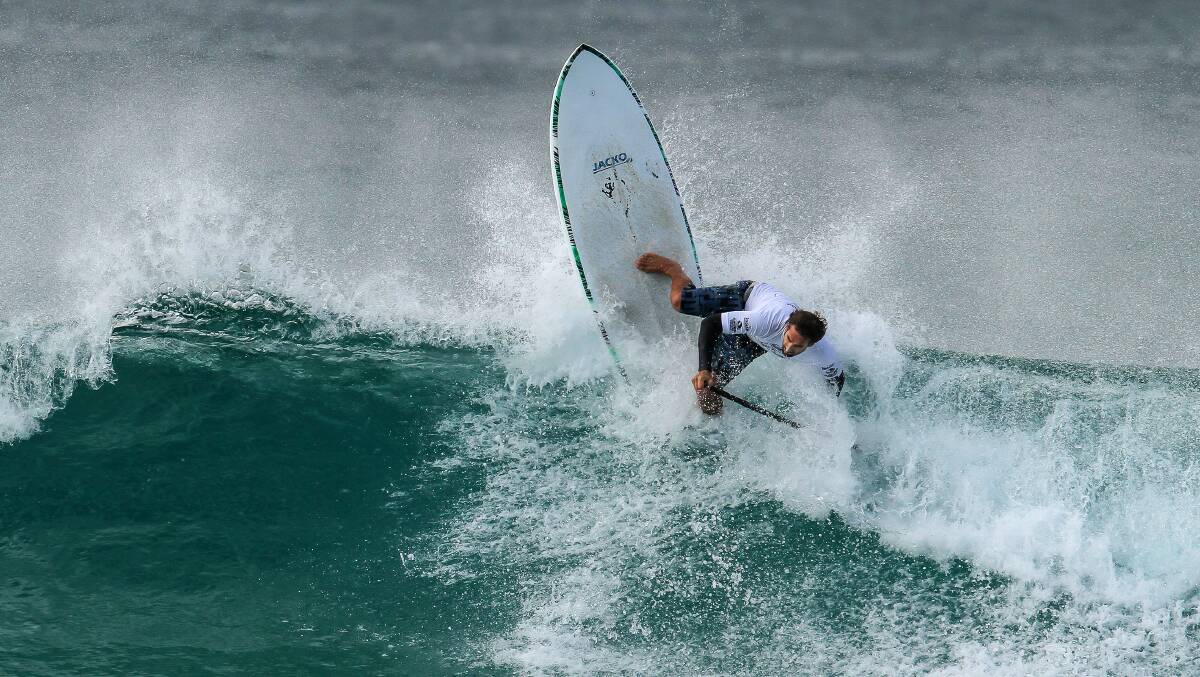 Big waves mean big tricks for Rick Jakovich. Photo by Surfing WA. 