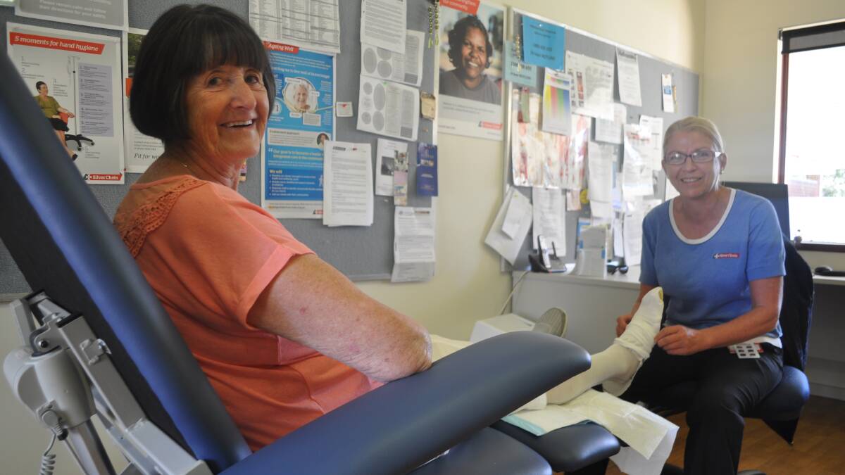 Gentle treatment: Client Joan Graham is assisted by nurse Heidi Hutchings in the new Silver Chain clinic.