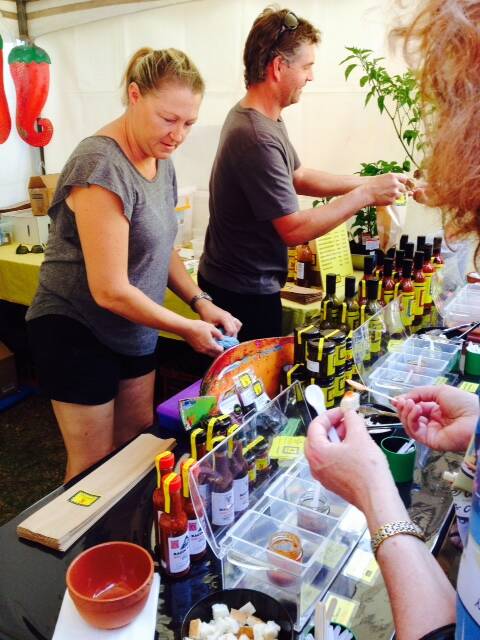 Ange and Andrew Longmore hard at work selling their hot product.