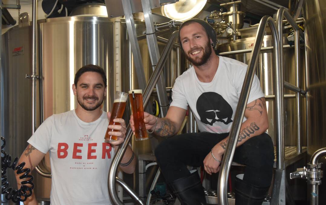 Grass roots brew: Colonial Brewery’s Ryan McLeod and Jacob Nesbit celebrate the truffle creation.