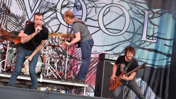 Ian Kenny, Mark Hosking and Jon Stockman of Australian progressive rock group Karnivool performing live on the Zippo Encore Stage at Download Festival in 2013. Photo: Getty Images.