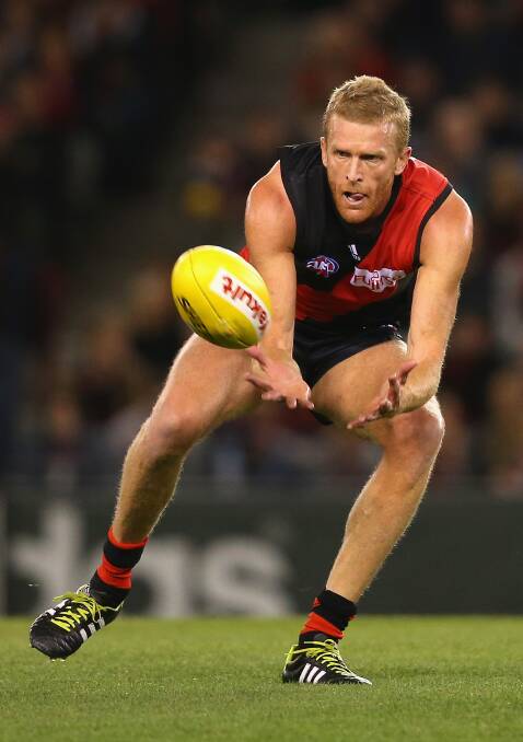 Dustin Fletcher of the Bombers marks during the round five AFL match between the Essendon Bombers and the St Kilda Saints at Etihad Stadium on April 19, 2014 in Melbourne, Australia. Photo: Quinn Rooney/Getty Images.