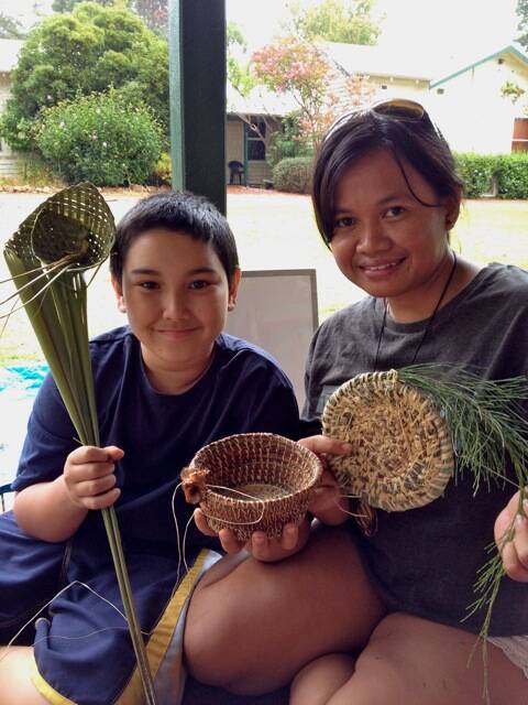 William Kilby and Jullia Indah Sari from Indonesia, participants in Harmony Day weaving activities.