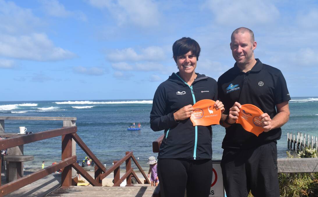Ready, set: Swimming Women's Charlotte O'Beirne with Margaret River Recreation Centre Operations Manager Dylan Brown and the 2017 Ocean Swim caps. Photo: Nicky Lefebvre