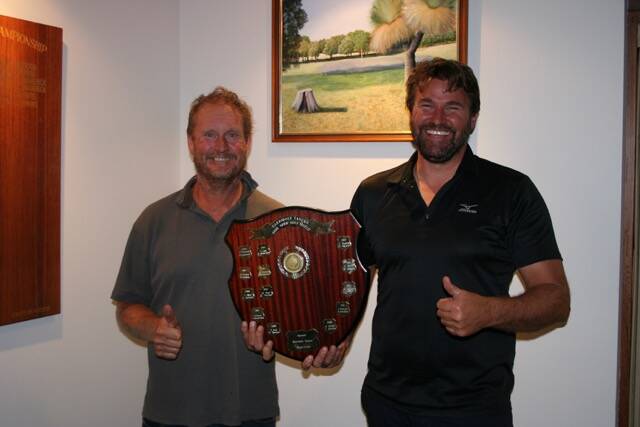Trophy kings: Graeme Challis and Nathan Adams with the Karridale Tavern Trophy. Photo: Supplied.