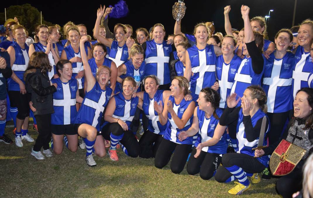 Winners: The triumphant Dunsborough Dragon Slayers team celebrate their home turf win in the hard fought game.