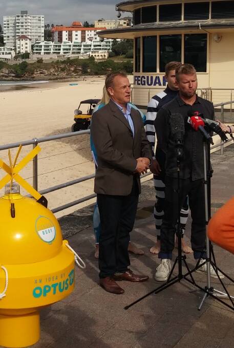 New venture: Shark Mitigation Systems co-founder Craig Anderson (left) with Yallingup surfer Taj Burrow at the announcement of the partnership. 