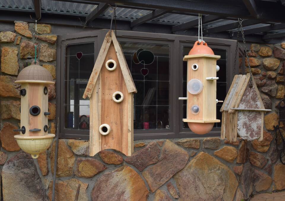 Homely: Birdhouses constructed from reclaimed timber and driftwood will be on display at the exhibition which runs until the end of October. 