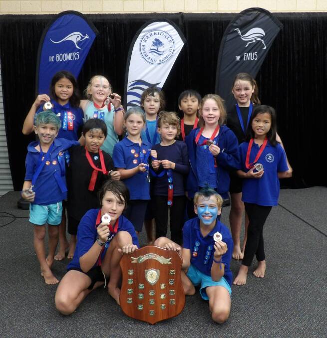 Karridale Primary School Champions and Runners Up with their medals at the Sports Day. 
BACK L-R: Karridale Primary School Students Clairevic, Tara, Isaac, Hans, Neve.
MIDDLE L-R: Daniel, Vhon, Alana, Edith, Stevie, Loraine.
FRONT L-R: The Boomers Vice Captain: Declan and Captain: Jack.