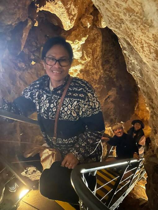 Janse Wila Lomi, Gaga Hsu and Julia Chen tackle the Jewel Cave stairs. Picture by Qiaoying Bao. 