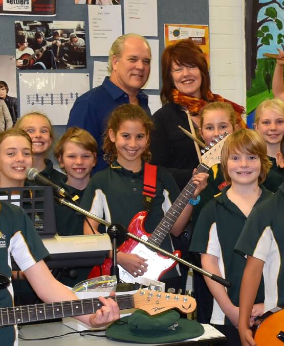 Committed: Rob and Karen Gough with some of the Margaret River Primary students who receive funding from the tavern's bi-annual rock show. Photo: Nicky Lefebvre
