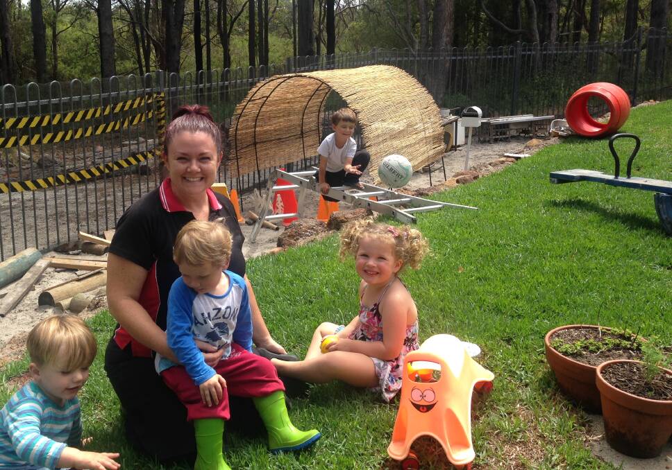 Harmony: BlueBelles Family Day Care owner and operator Belinda Robinson with Liam, Seth, Olive and Caiden.  Photo: Supplied.