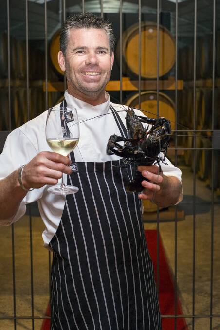 Top drop: Leeuwin Estate head chef Dany Angove with the restaurant s fresh produce and the winery s award winning chardonnay in the venue s art gallery.  
                                                              Photo: Sandy Powell