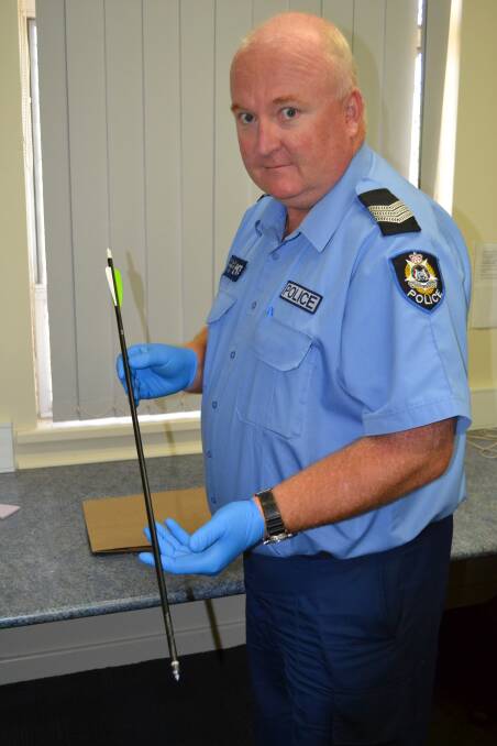 Dangerous: Sergeant Brett Cassidy with one of the arrows found.