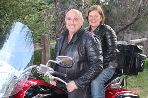 GEARED UP: Peter and Diane Simmonds get the bike ready for the six-day Black Dog Ride to support mood disorders.