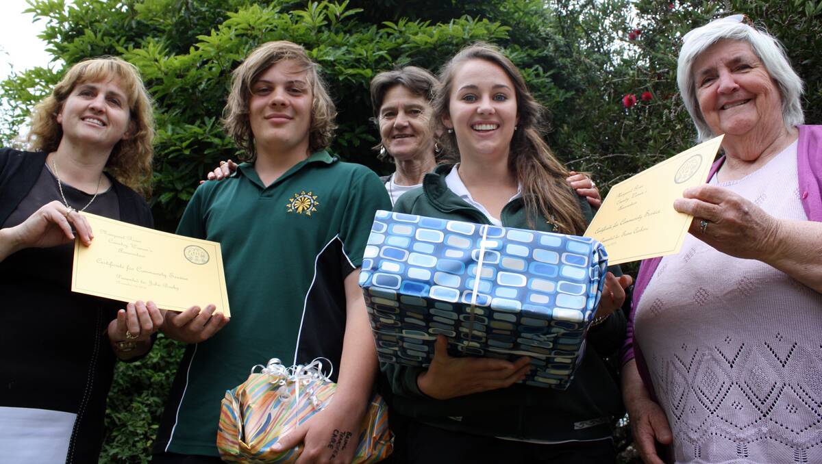 John Busby and Tiana Carboni, year 10, are presented with community service awards by Cadets Unit Leader Wendy Coffey, Gudrun Hangartner and Lynn Jones of the Margaret River CWA. (gp cadets CWA).