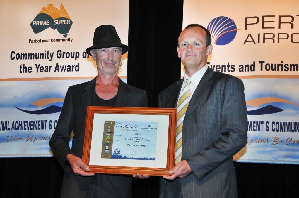 IN RECOGNITION: Dave Seegar accepts the Soup Kitchen’s certificate from Lachlan Baird, chief executive officer of Prime Super.