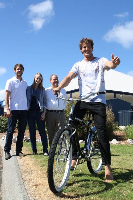 Thumbs up: Surfpoint's Ben Swanson, Alison Newby and Peter Swanson could not capture the thief but are happy to give Richard Lowe his beloved bike back.
