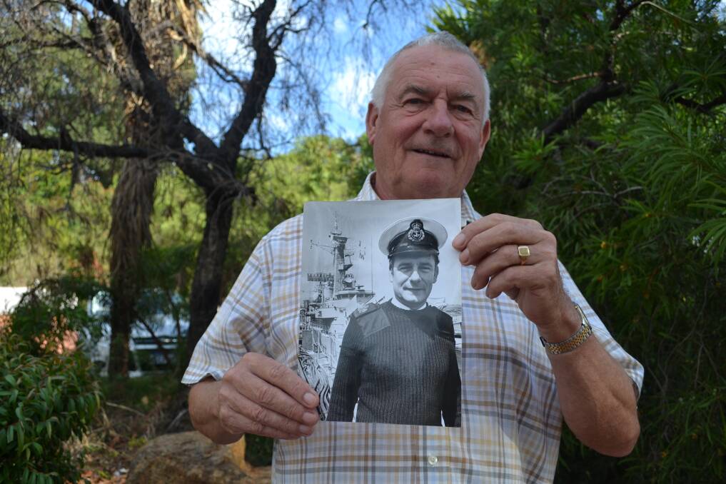 Then and now: Ian Sargeant displays a picture of himself in his Royal Navy days.