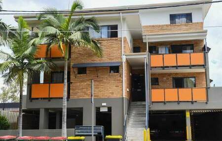 The Alderley apartment block where Ms Glover's remains were found behind a wall. Picture by Jono Searle/AAP PHOTOS