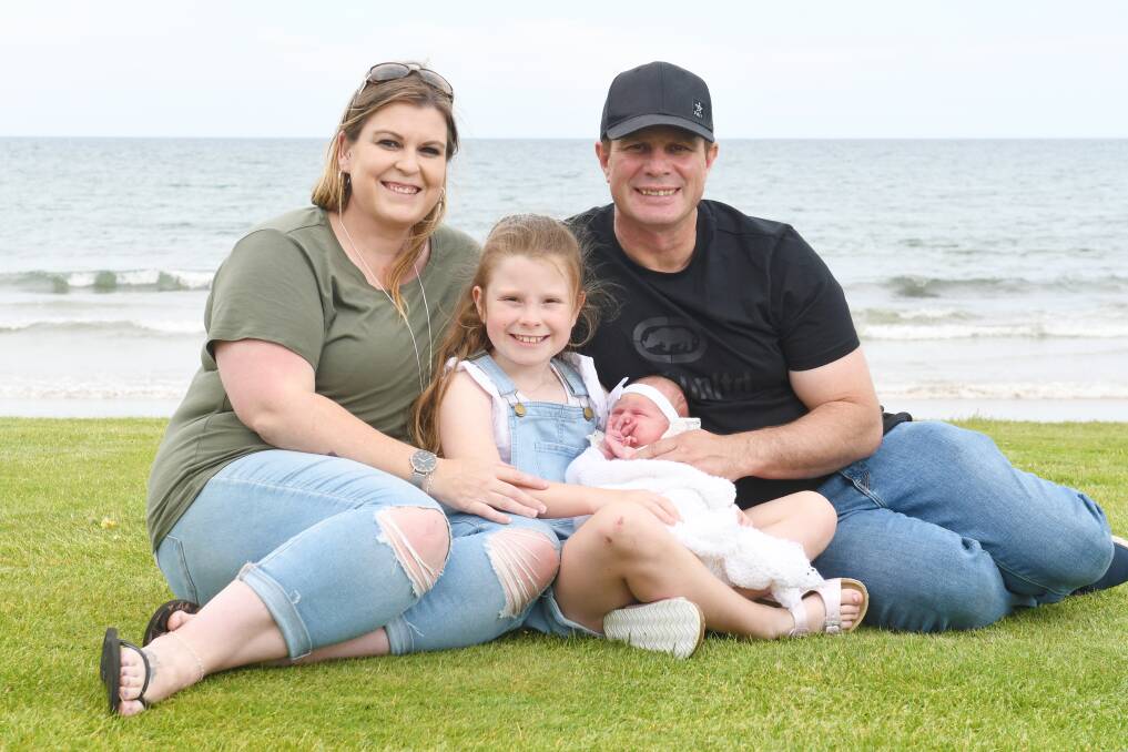 GRATEFUL: Karen and Dion Clarke with their daughters Harper and Atley. Picture: Brodie Weeding 