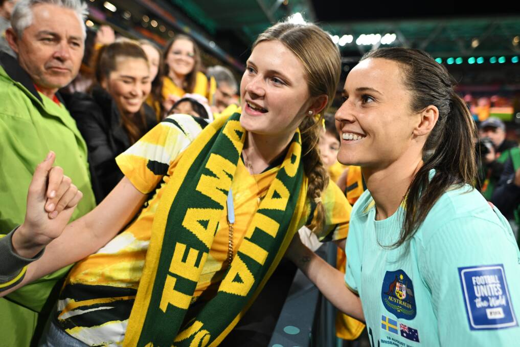 Matildas player Hayley Raso greets an Australian supporter following the side's loss to Sweden in Brisbane on Saturday night. Picture - Getty Images