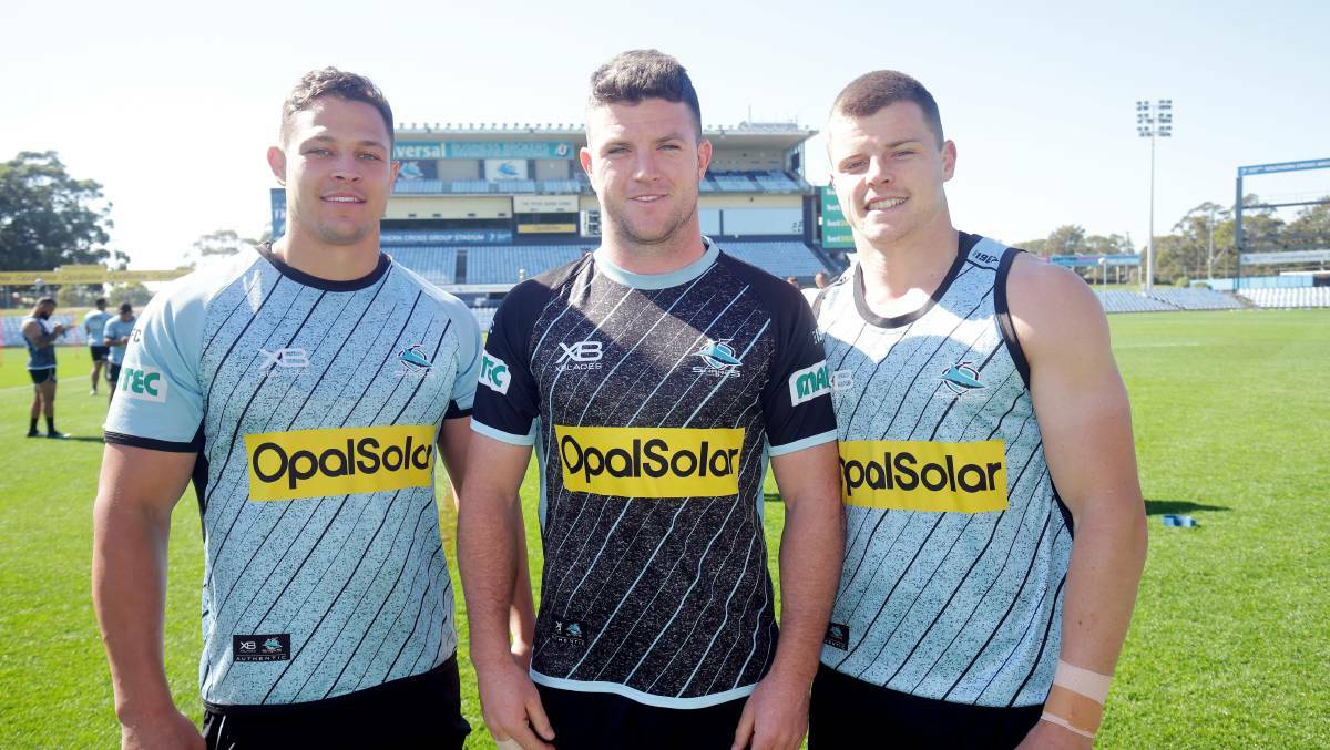 Sharks juniors Scott Sorensen, Chad Townsend and Jayden Brailey are one game away from an NRL grand final with Cronulla. Picture: Chris Lane