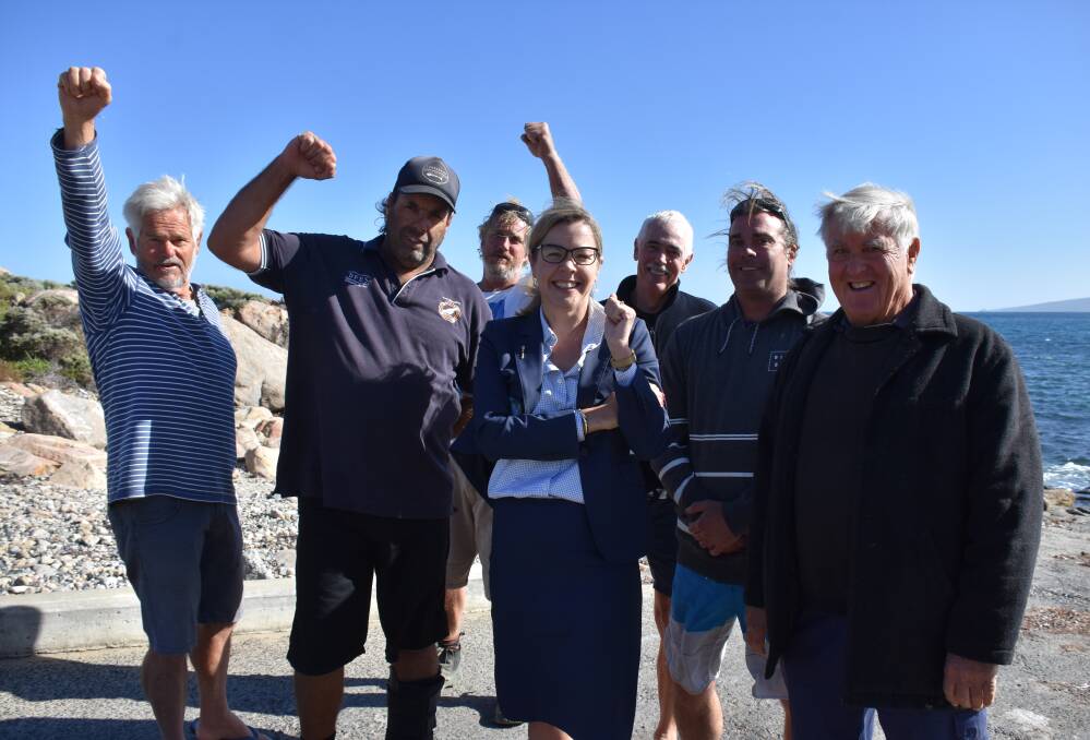 People power: Residents celebrate after the state government announced the boat ramp would remain open in March. Photo: Busselton-Dunsborough Mail.