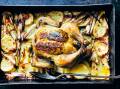 Roast garlic chicken on potato and leek gratin. Picture by Chris Court. Recipe and styling: Donna Hay