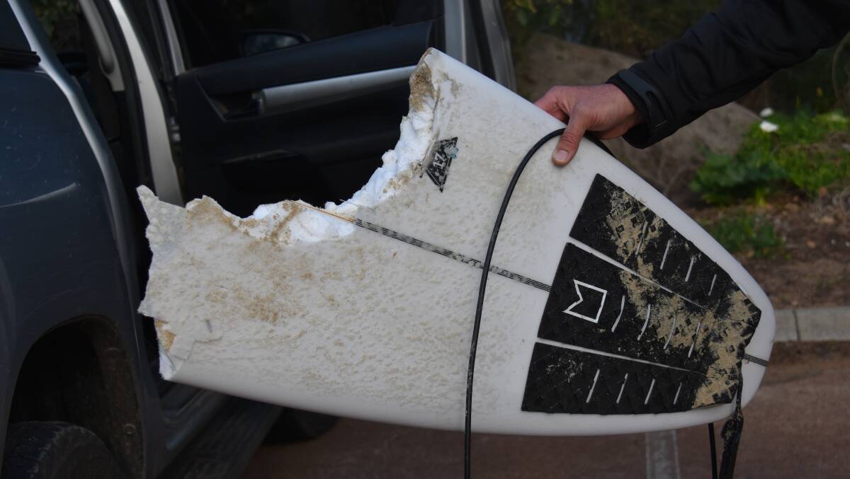 The surfboard of a man who was attacked by a shark at Bunker Bay on July 31, 2020.