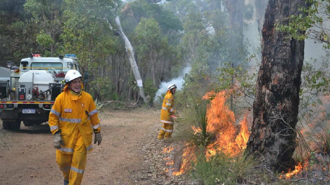 Yallingup Rural Volunteer Bushfire Brigade's Allan Yardley on a prescribed burn in Meelup Regional Park. Image supplied.