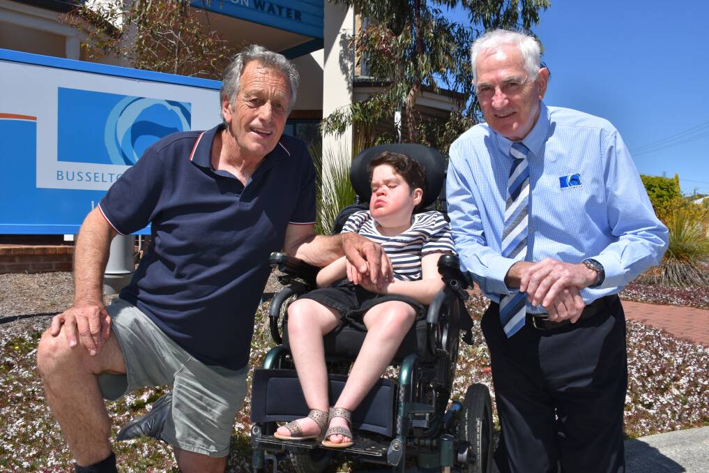 Disabled Surfer's Association South West president Ant Purcell with surfer Tahnee King and Busselton Water chief executive officer Chris Elliott.