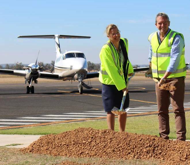 Vasse MLA Libby Mettam and Warren-Blackwood MLA Terry Redman at a sod turning ceremony at the Busselton Margaret River Airport.