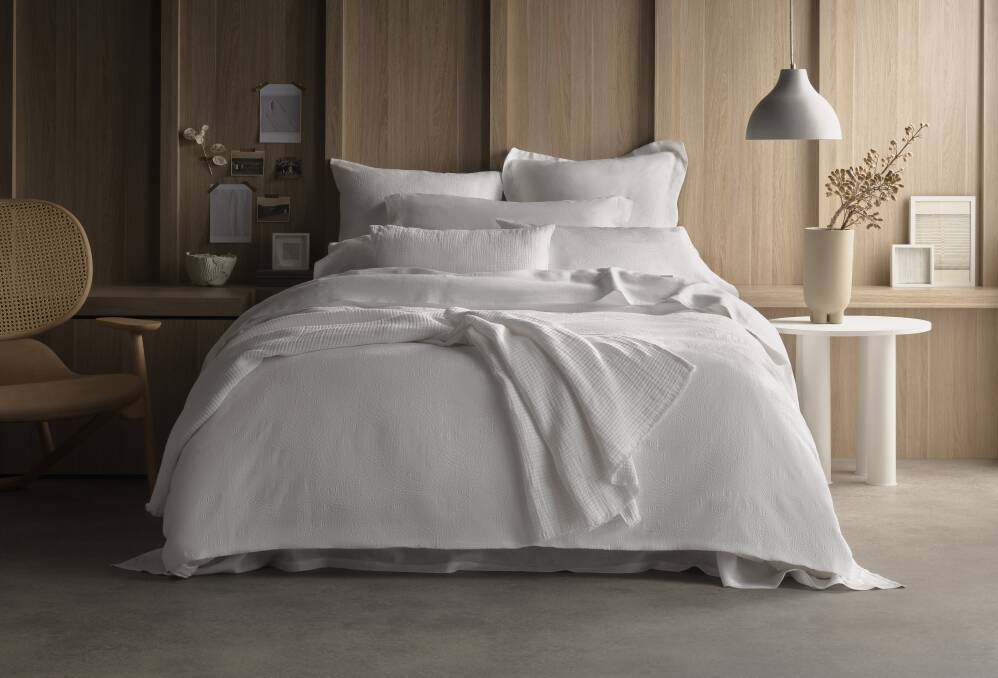 SIMPLY STYLISH: Lyrical white quilt cover from Sheridan's new autumn/winter range. 