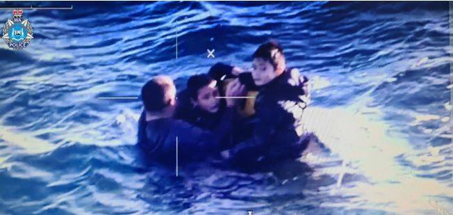 Radio that floated by saves man, two boys clinging to sinking boat